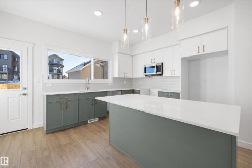 4594 Warbler Loop, Edmonton, AB - Indoor Photo Showing Kitchen With Upgraded Kitchen