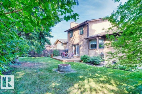 View of yard with a fire pit and a deck - 10429 28A Avenue, Edmonton, AB - Outdoor