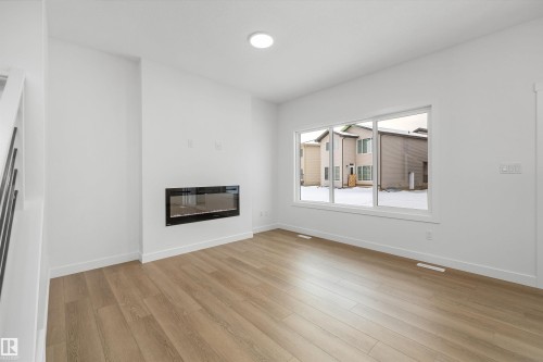2816 190 Street, Edmonton, AB - Indoor Photo Showing Other Room With Fireplace