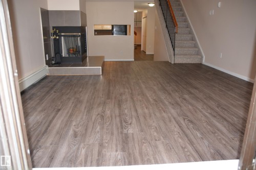 11176 83 Avenue, Edmonton, AB - Indoor Photo Showing Other Room With Fireplace