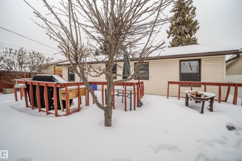 View of snow covered deck - 8908 130 Avenue Nw, Edmonton, AB - Outdoor