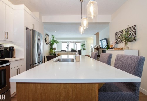 7200 Cardinal Way, Edmonton, AB - Indoor Photo Showing Kitchen With Stainless Steel Kitchen With Double Sink