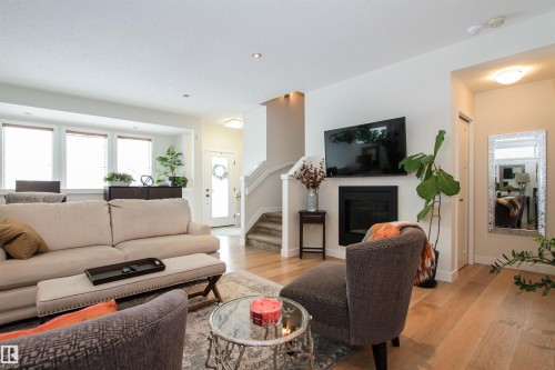 7200 Cardinal Way, Edmonton, AB - Indoor Photo Showing Living Room With Fireplace