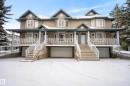 View of front facade with a garage and a porch - 44 903 Rutherford Road, Edmonton, AB  - Outdoor With Deck Patio Veranda With Facade 