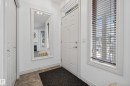 Foyer entrance with baseboards - 44 903 Rutherford Road, Edmonton, AB  - Indoor Photo Showing Other Room 