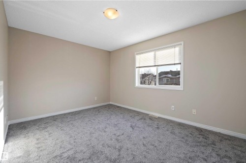 5 130 Hyndman Crescent, Edmonton, AB - Indoor Photo Showing Other Room