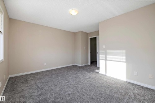 5 130 Hyndman Crescent, Edmonton, AB - Indoor Photo Showing Other Room