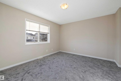 5 130 Hyndman Crescent, Edmonton, AB - Indoor Photo Showing Other Room