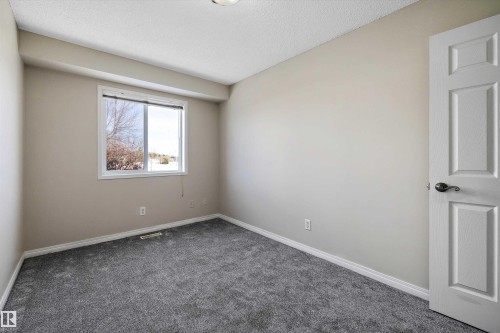 5 130 Hyndman Crescent, Edmonton, AB - Indoor Photo Showing Other Room