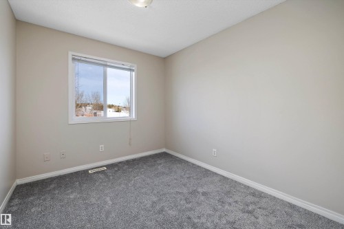 5 130 Hyndman Crescent, Edmonton, AB - Indoor Photo Showing Other Room
