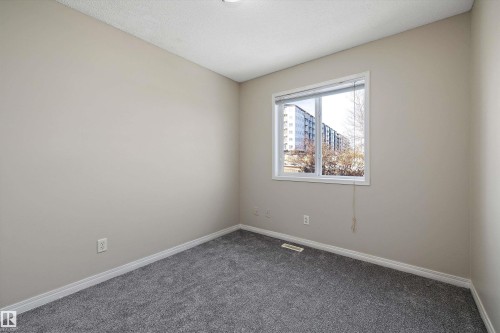 5 130 Hyndman Crescent, Edmonton, AB - Indoor Photo Showing Other Room
