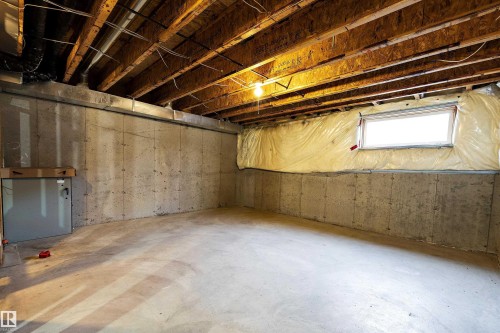 5 130 Hyndman Crescent, Edmonton, AB - Indoor Photo Showing Basement