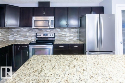 107 2045 Grantham Crest, Edmonton, AB - Indoor Photo Showing Kitchen With Upgraded Kitchen