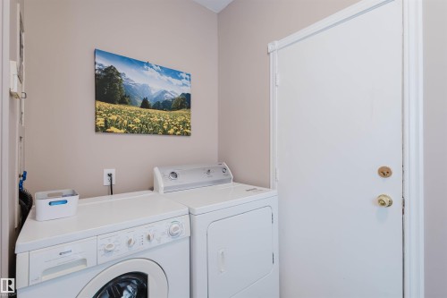 Laundry room featuring washer and dryer - 11519 37A Avenue, Edmonton, AB - Indoor Photo Showing Laundry Room