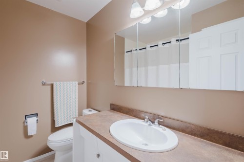 Full bathroom with vanity and curtained shower - 11519 37A Avenue, Edmonton, AB - Indoor Photo Showing Bathroom