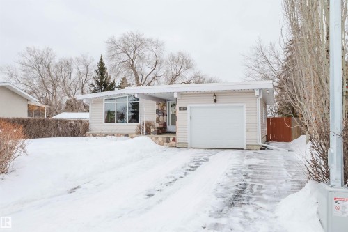 View of front facade with a garage - 11519 37A Avenue, Edmonton, AB - Outdoor With Facade