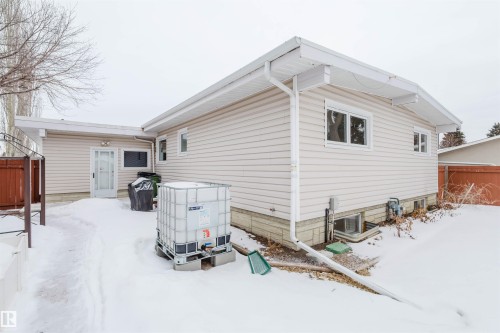 View of snow covered back of property - 11519 37A Avenue, Edmonton, AB - Outdoor With Exterior