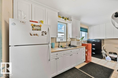 8155 79 Avenue, Edmonton, AB - Indoor Photo Showing Kitchen With Double Sink