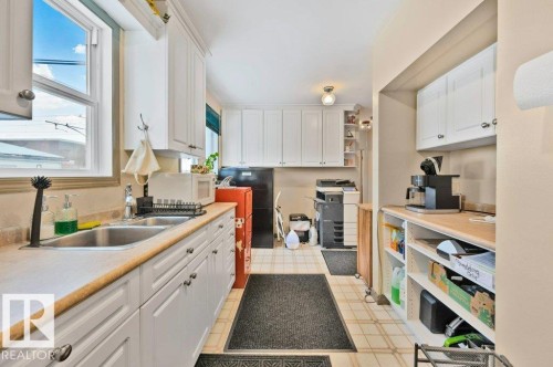 8155 79 Avenue, Edmonton, AB - Indoor Photo Showing Kitchen With Double Sink