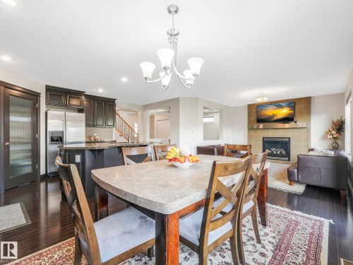 2651 Anderson Crescent, Edmonton, AB - Indoor Photo Showing Dining Room With Fireplace