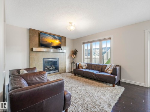 2651 Anderson Crescent, Edmonton, AB - Indoor Photo Showing Living Room With Fireplace