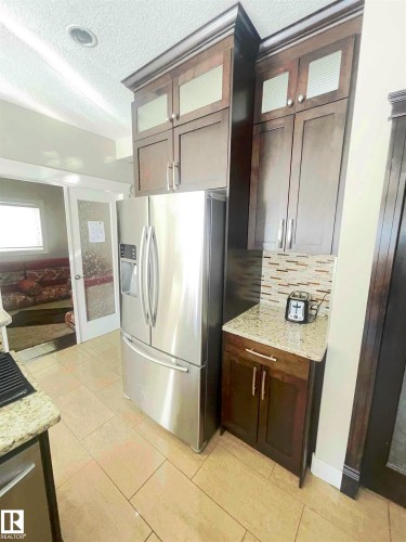 Edmonton, AB - Indoor Photo Showing Kitchen