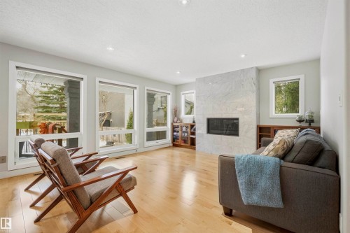 9324 95 Street, Edmonton, AB - Indoor Photo Showing Living Room With Fireplace