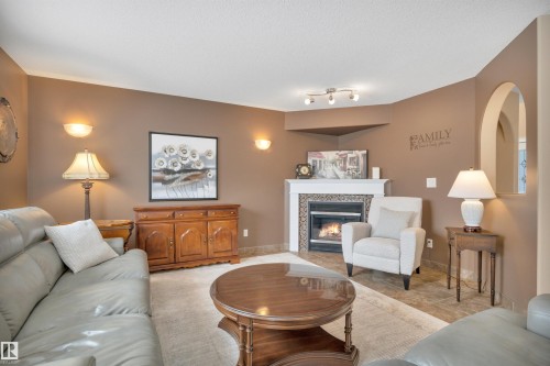 5 Elbow Place, St. Albert, AB - Indoor Photo Showing Living Room With Fireplace