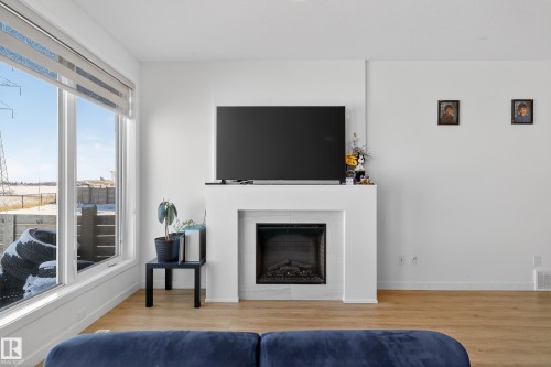 9194 Pear Drive Sw, Edmonton, AB - Indoor Photo Showing Living Room With Fireplace