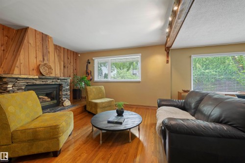 11622 76 Avenue, Edmonton, AB - Indoor Photo Showing Living Room With Fireplace