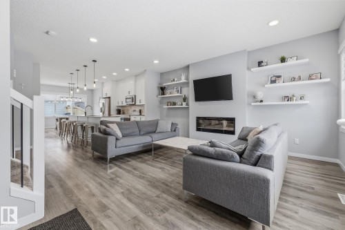 17475 77 Street, Edmonton, AB - Indoor Photo Showing Living Room With Fireplace