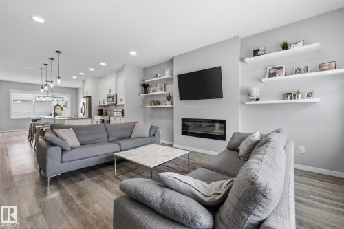 17475 77 Street, Edmonton, AB - Indoor Photo Showing Living Room With Fireplace
