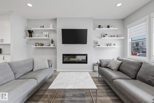 17475 77 Street, Edmonton, AB - Indoor Photo Showing Living Room With Fireplace