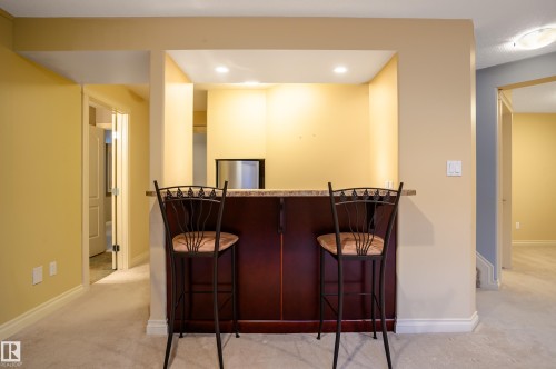 Indoor dry bar featuring light colored carpet and recessed lighting - 48 Fairway Point(E), Spruce Grove, AB - Indoor Photo Showing Other Room