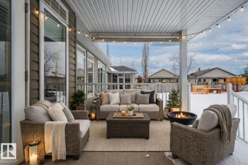 out door living space - 48 Fairway Point(E), Spruce Grove, AB -  With Deck Patio Veranda With Exterior