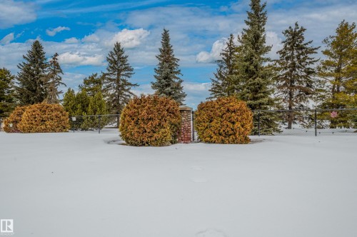 Snow covered property - 48 Fairway Point(E), Spruce Grove, AB - Outdoor With View