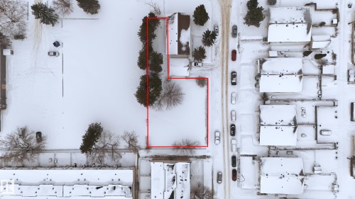 Aerial view of property and surrounding area with property parcel outlined - 13908 64 Street, Edmonton, AB 