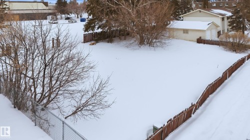 View of yard layered in snow - 13908 64 Street, Edmonton, AB 