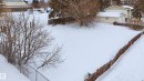 View of yard layered in snow - 13908 64 Street, Edmonton, AB 