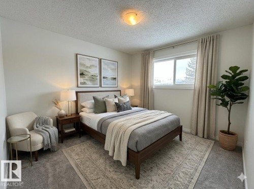 Virtually staged Bedroom featuring light colored carpet and a textured ceiling - 13323 68 Street, Edmonton, AB - Indoor Photo Showing Bedroom