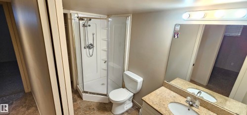 Full bath with vanity and a shower stall - 4827 54 Avenue, Wetaskiwin, AB - Indoor Photo Showing Bathroom
