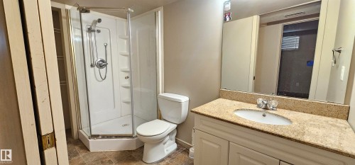 Full bathroom featuring vanity and a stall shower - 4827 54 Avenue, Wetaskiwin, AB - Indoor Photo Showing Bathroom