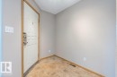 Entryway featuring baseboards and stone finish floors - 4827 54 Avenue, Wetaskiwin, AB  - Indoor Photo Showing Other Room 