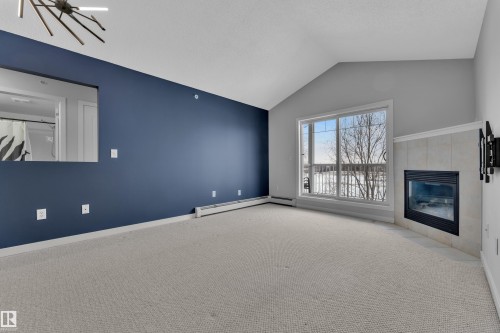 306 905 Blacklock Way, Edmonton, AB - Indoor With Fireplace