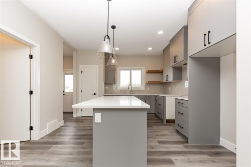 201 Caledonia Drive, Leduc, AB - Indoor Photo Showing Kitchen