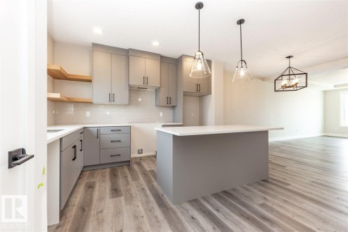 201 Caledonia Drive, Leduc, AB - Indoor Photo Showing Kitchen