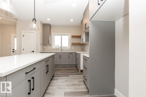 201 Caledonia Drive, Leduc, AB - Indoor Photo Showing Kitchen
