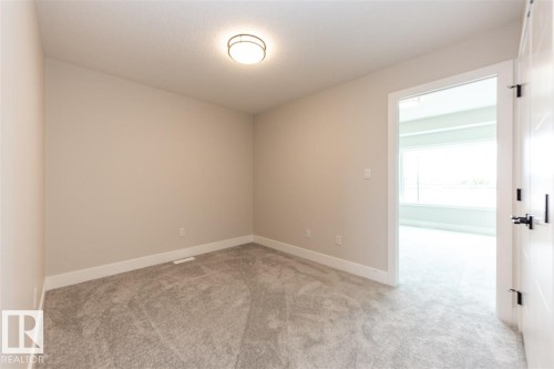 201 Caledonia Drive, Leduc, AB - Indoor Photo Showing Other Room