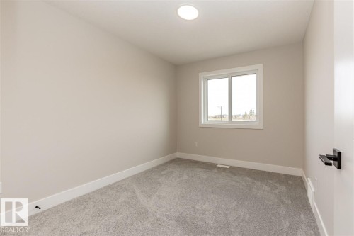 201 Caledonia Drive, Leduc, AB - Indoor Photo Showing Other Room