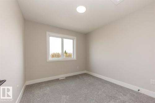 201 Caledonia Drive, Leduc, AB - Indoor Photo Showing Other Room